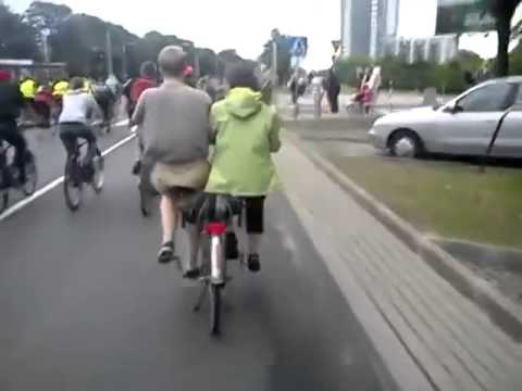 Two people share one bike
